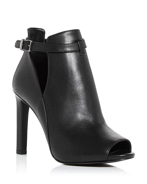 michael kors bootie heels|Michael Kors heeled boots.